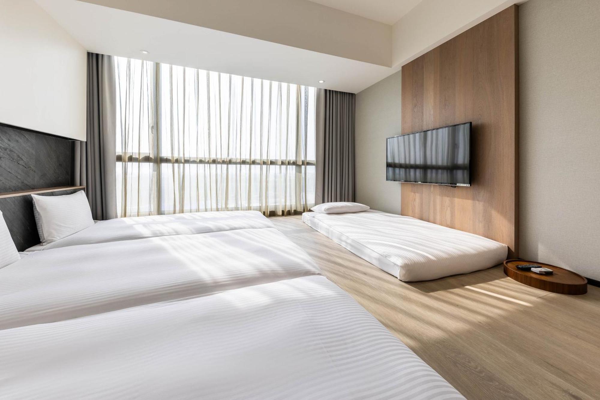 Hsin Hotel Chiayi Habitación foto Deluxe Room